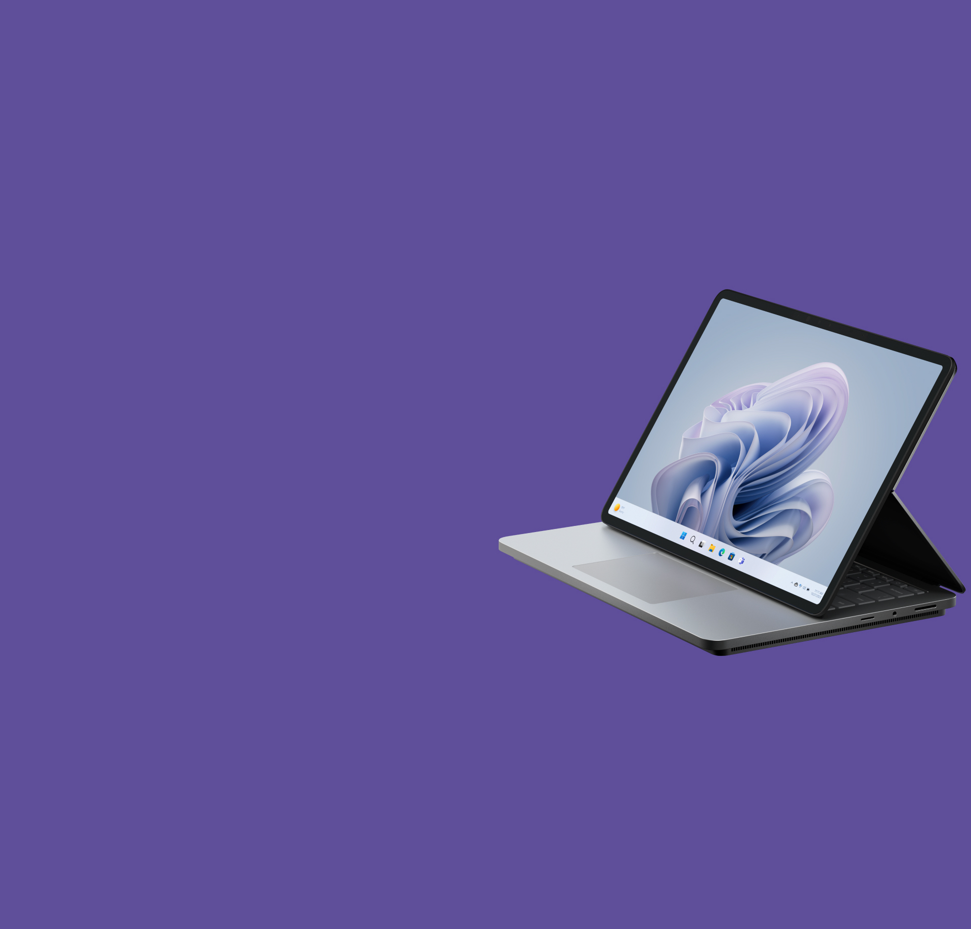 زاوية جانبية لـSurface Laptop Studio 2 تعرض شاشة Windows bloom.